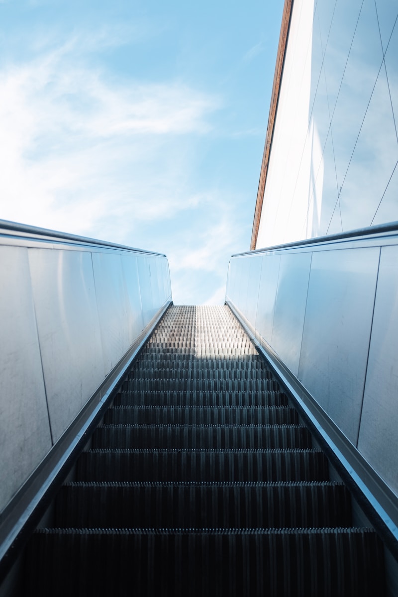 an escalator going up into the sky